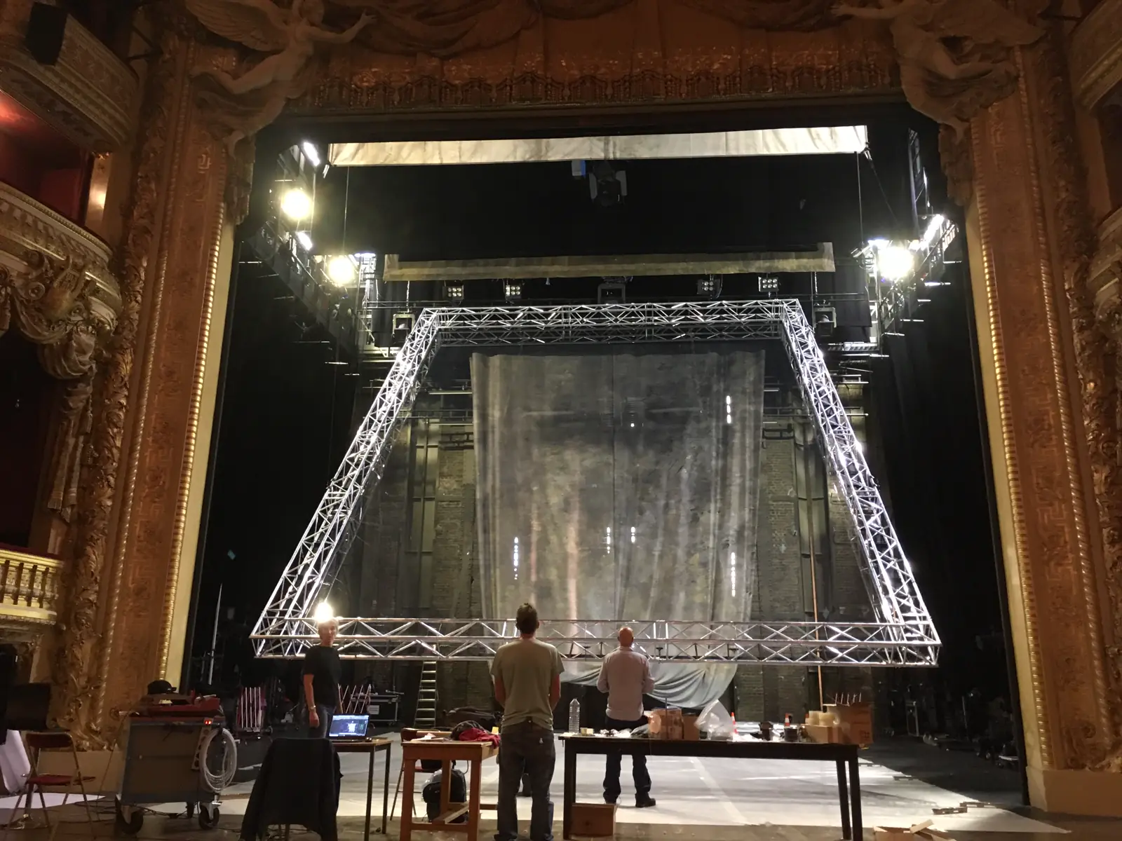 Steel structure and stretched gauze rigged in a proscenium theatre